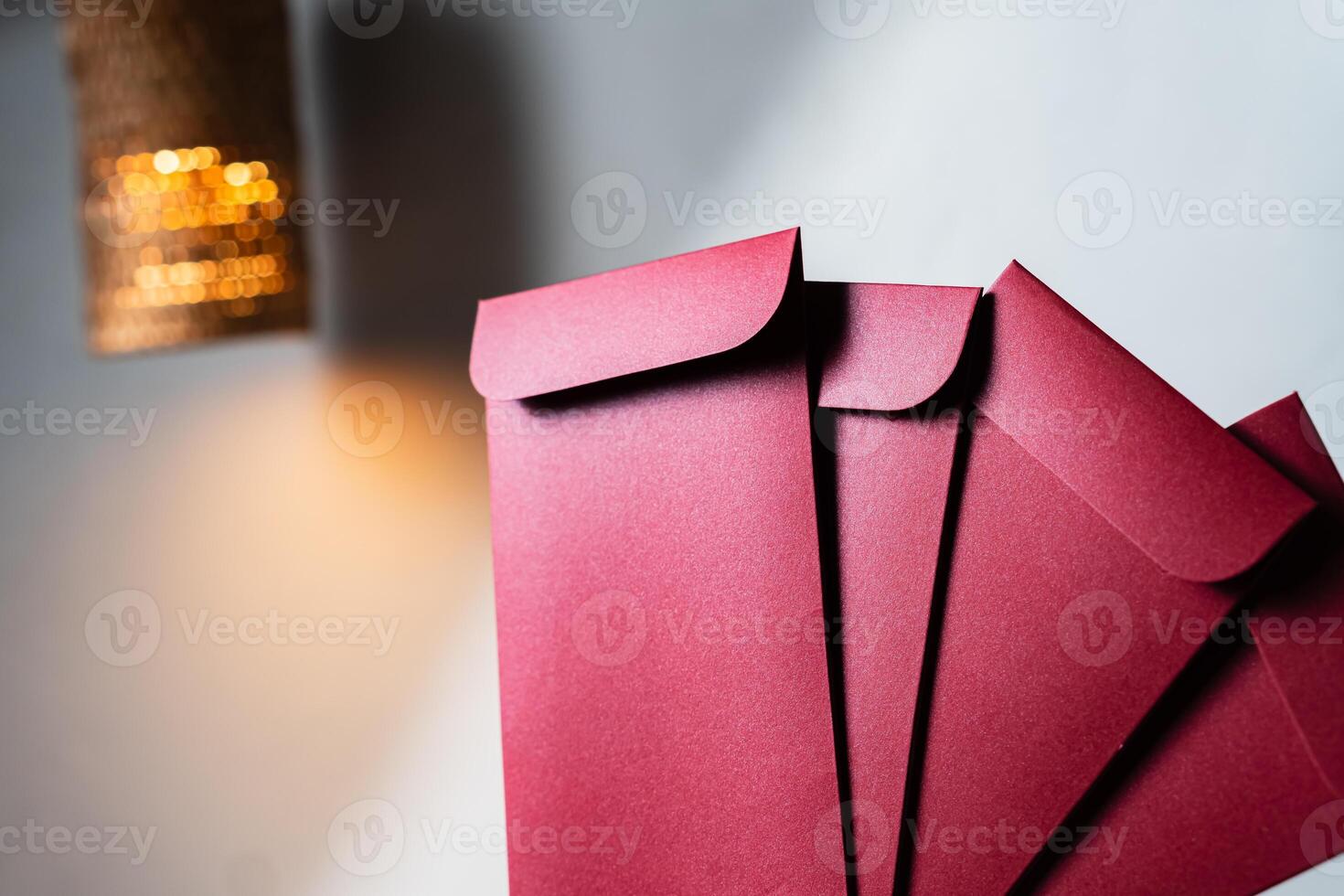 Elegant Red Envelopes with Warm Lighting photo
