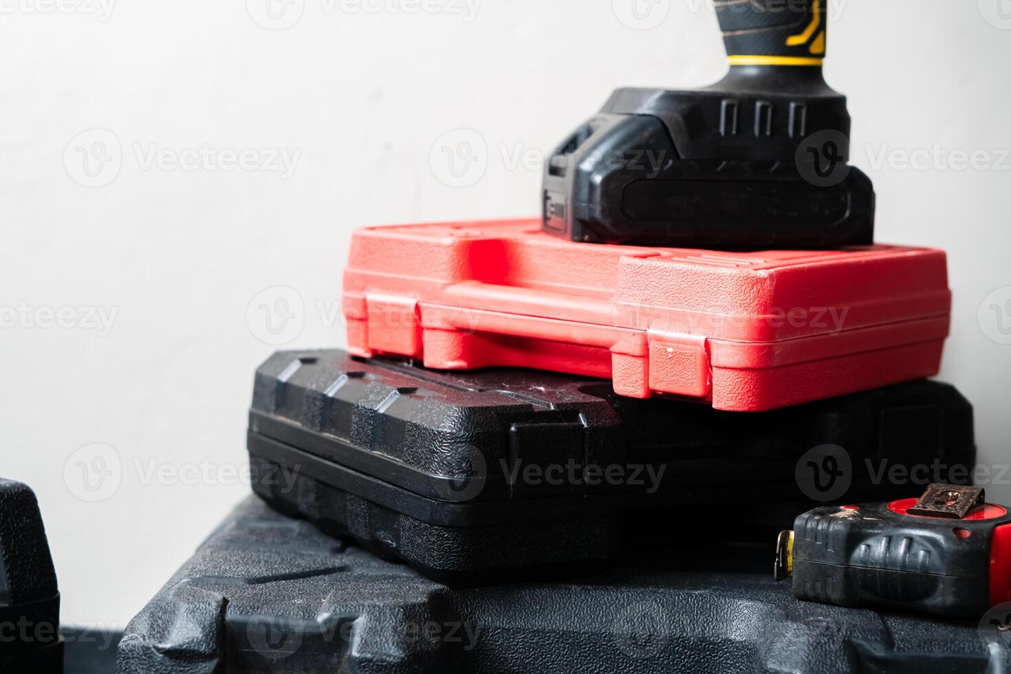 Stack of Tool Cases with Power Drill photo