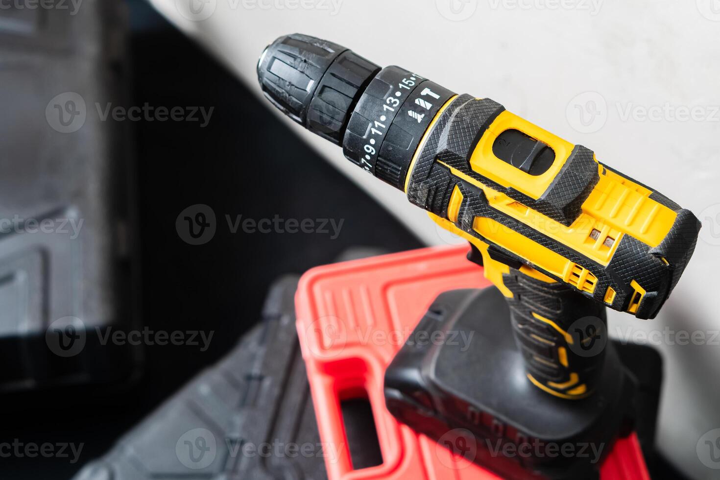 Cordless Drill on Red Tool Box photo