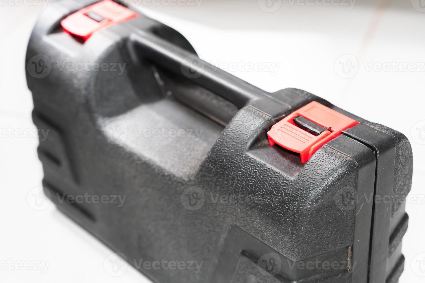Durable Black Tool Case with Red Latches photo