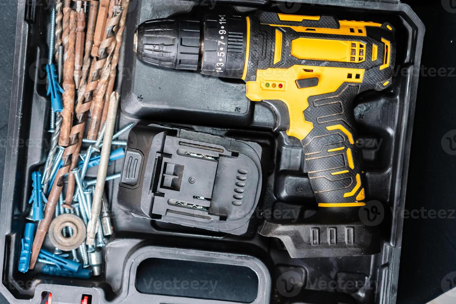 Cordless Drill in Toolbox with Accessories photo