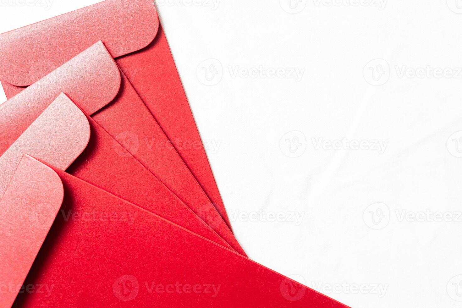 Collection of Glossy Red Envelopes on White Background photo
