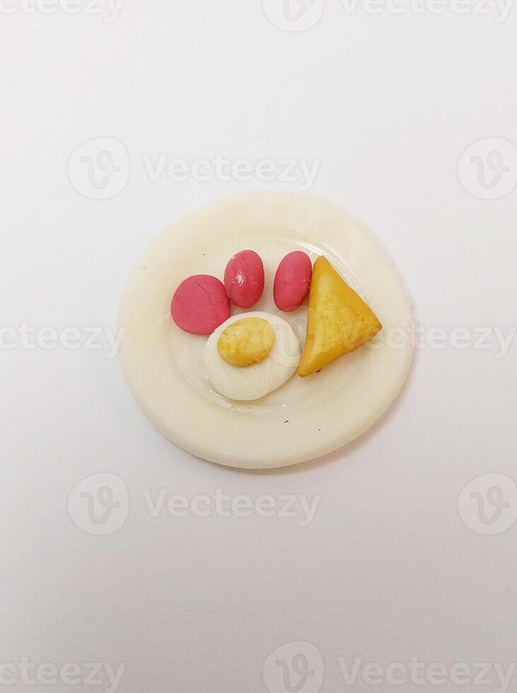 breakfast cocktail sausage fried egg toast miniature cute handmade clay isolated sculpture food photo