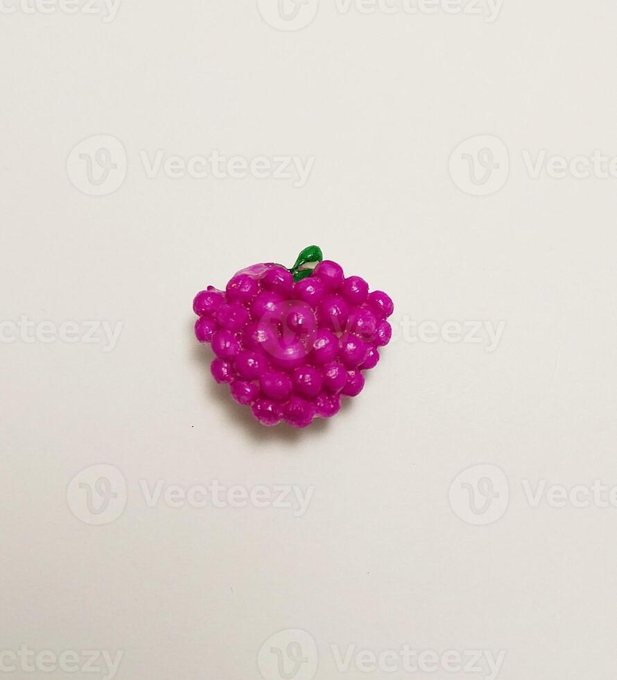 violet grape fruit miniature cute handmade clay isolated sculpture food photo