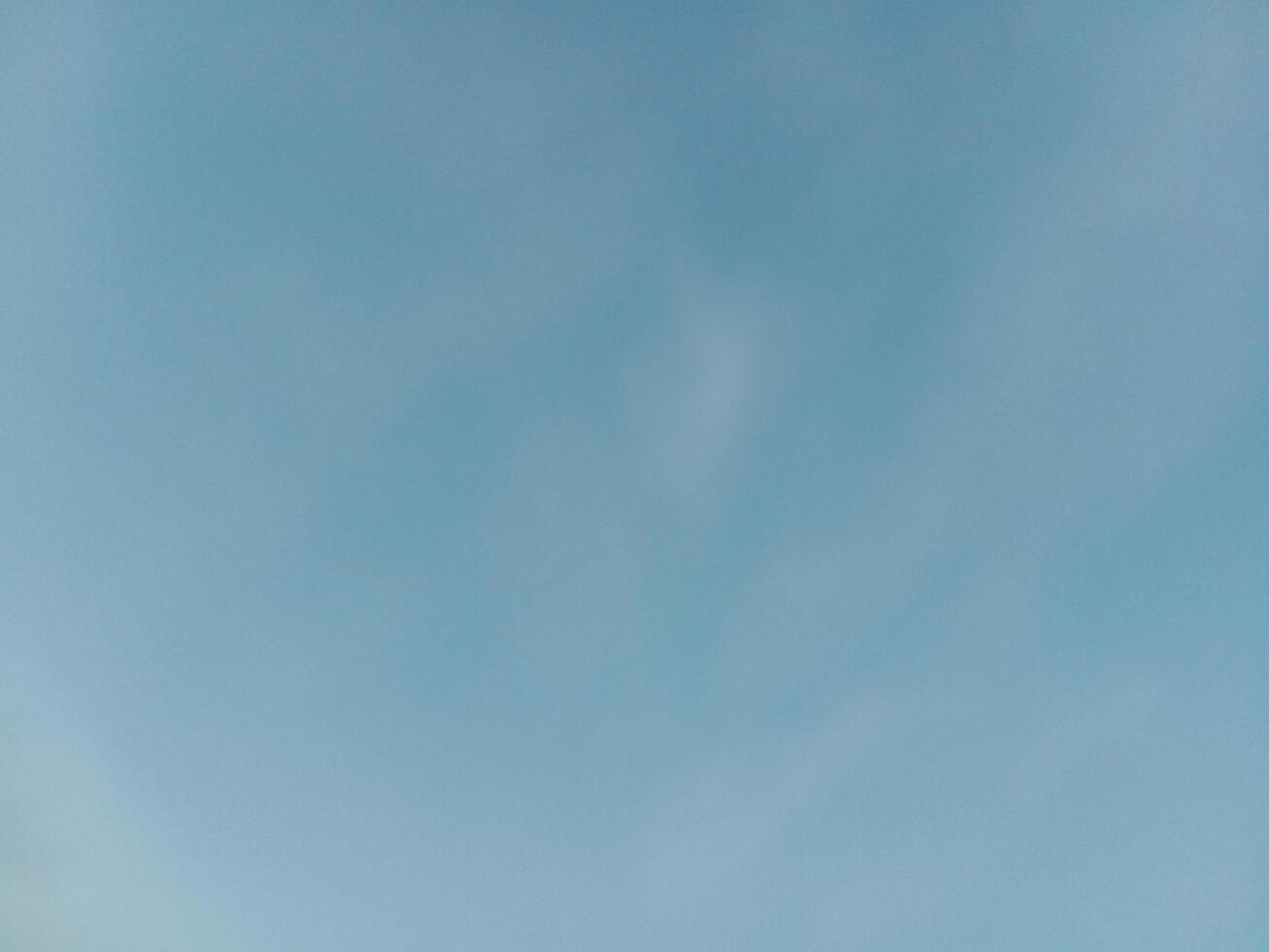 blue sky background with tiny clouds, soft focus, and copy space. Natural beautiful blue sky and white cloud background,At Afternoon. photo
