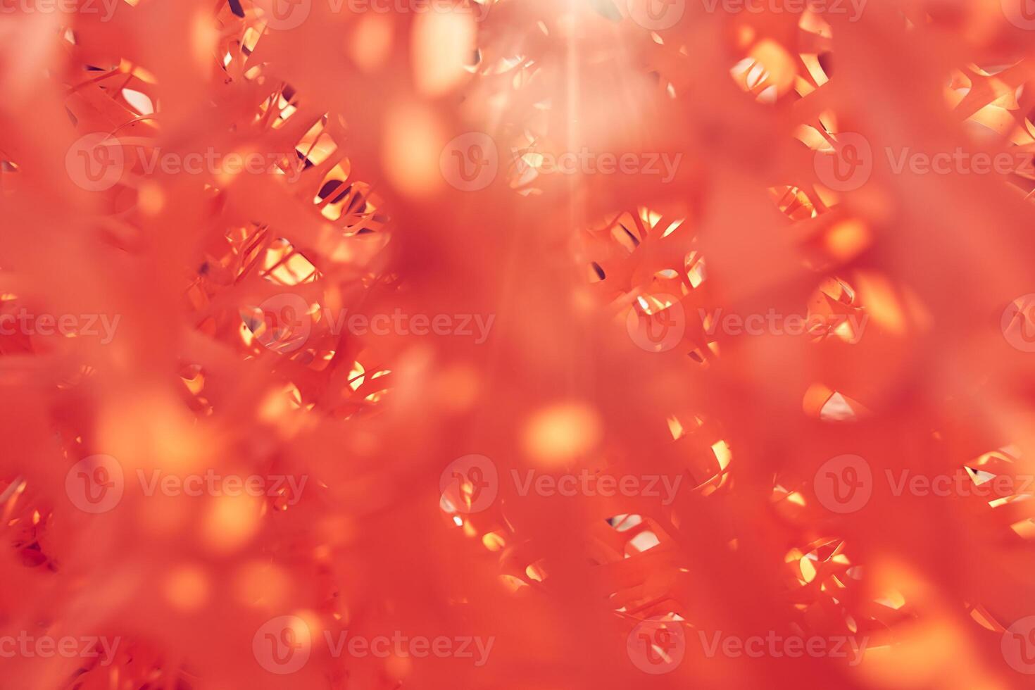 A bunch of orange mesh for reinforcing walls in the process of warming a building outdoors, a tangled piece of mesh photo