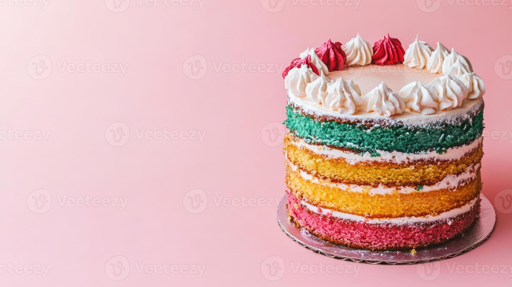 Colourful buttercream layered birthday cake isolated on pink background with copy space. Sweet dessert for dinner party photo