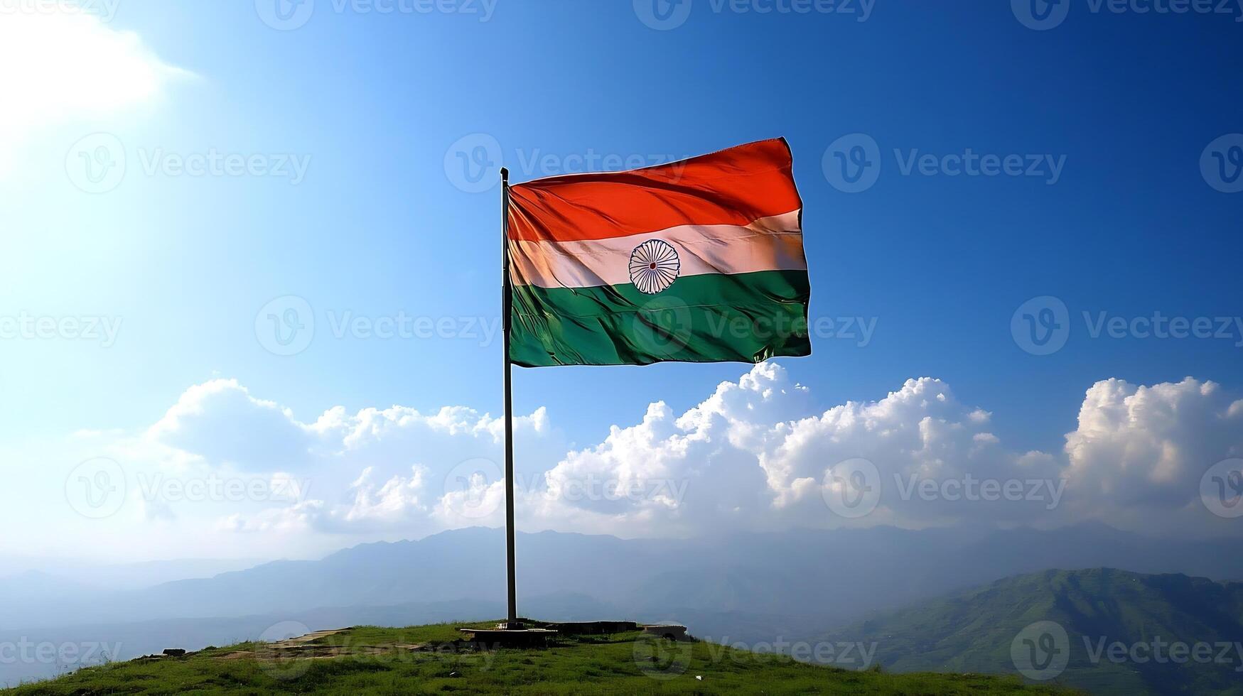 Indian Flag Waving Proudly with Scenic Mountain and Sky photo