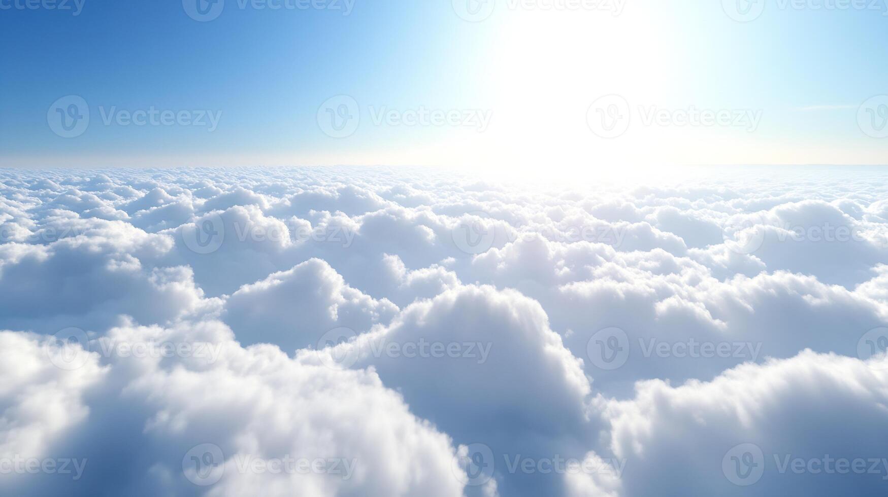 Expansive Sea of White Clouds Extending Infinitely Under a Bright Sunlit Sky photo