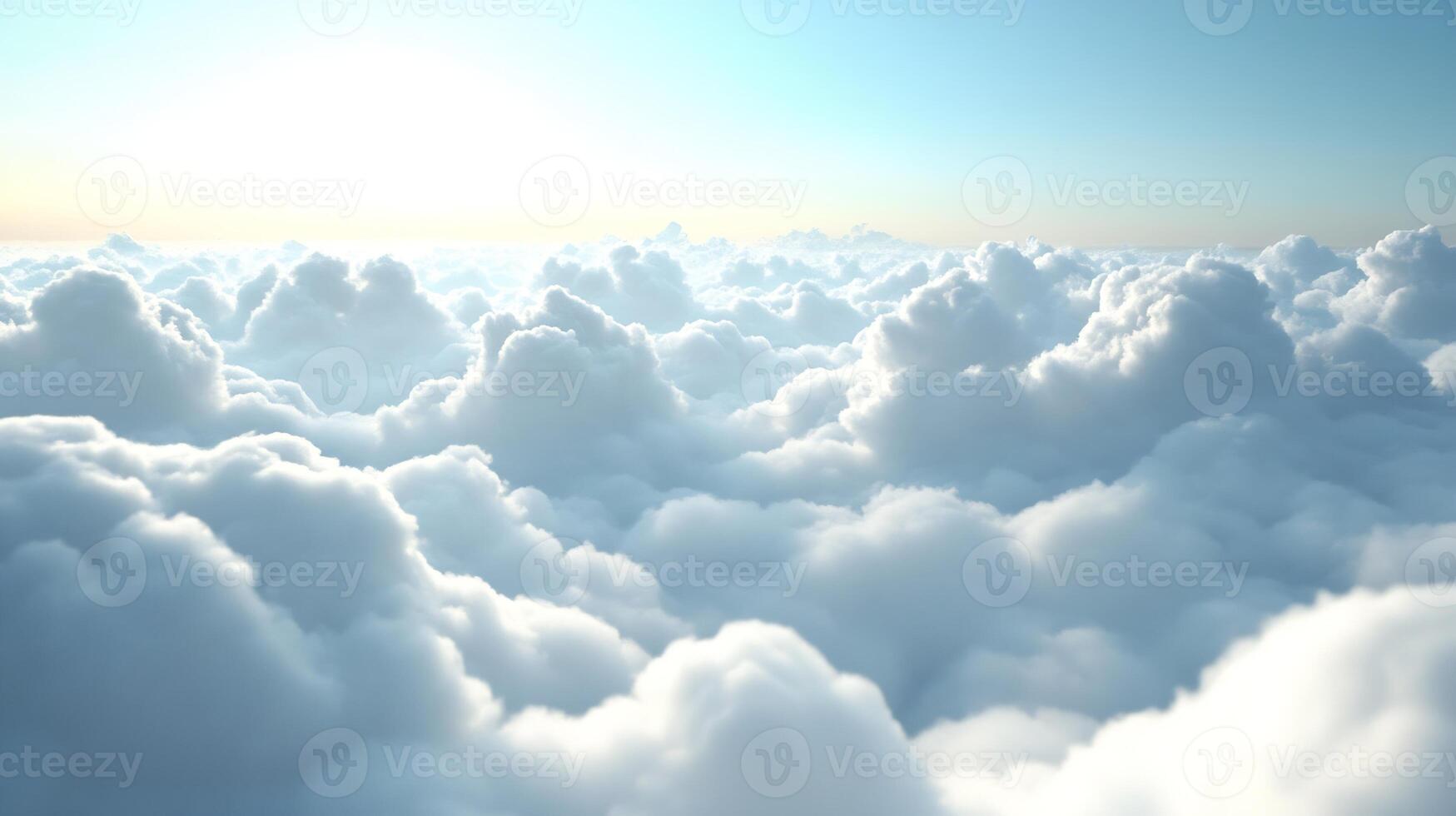 Soft Fluffy White Clouds Illuminated by Golden Sunlight in a Clear Blue Sky photo