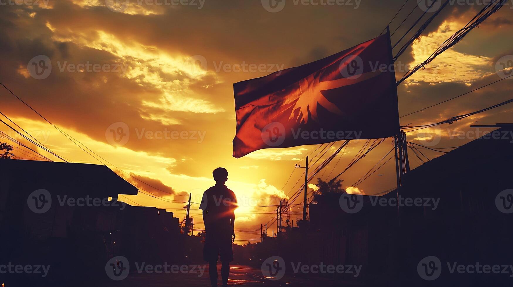 Silhouette of a Person Holding a Flag Against Sunset Backdrop photo