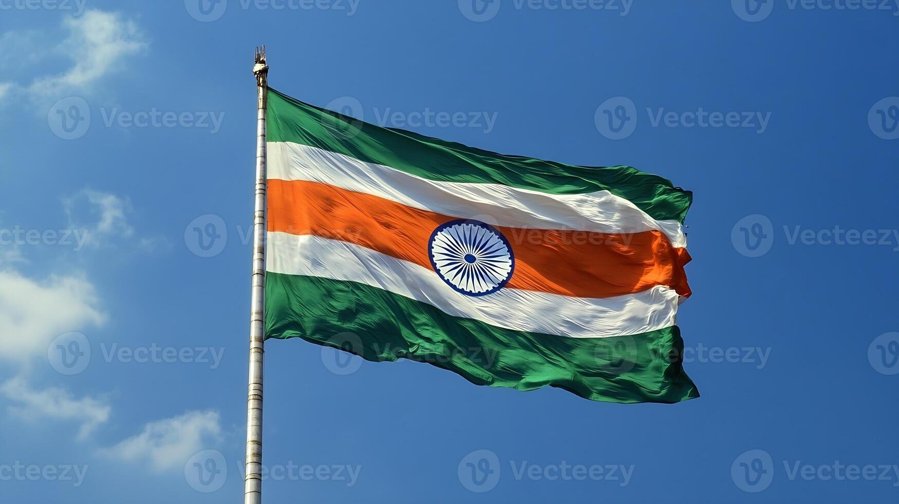 Indian Flag Flying High Against Blue Sky Symbolizing Independence and Diversity photo
