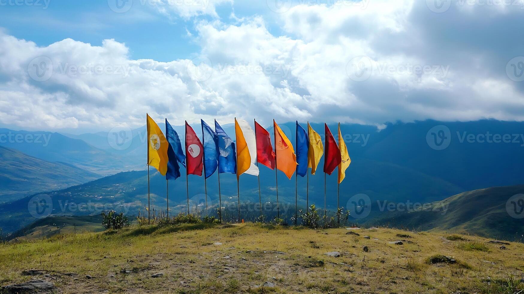 International Flags Displayed on Mountainside with Scenic Cloudy Sky photo