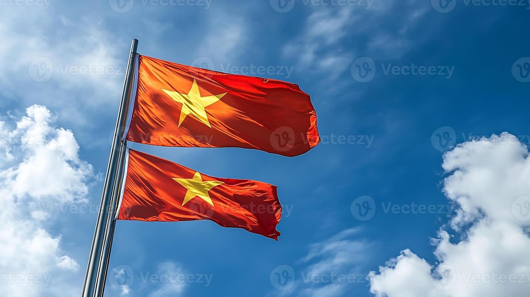 Majestic Twin Flags Waving in Blue Sky Symbolizing Unity and National Pride photo