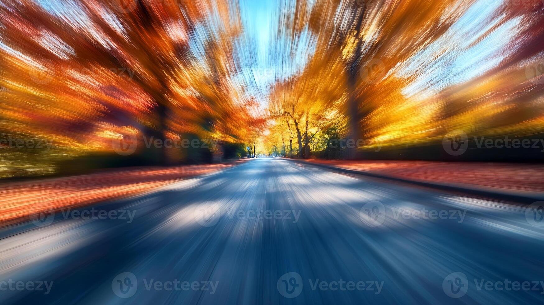 Speeding Image of Autumn Forest Road with Vivid Fall Colors photo