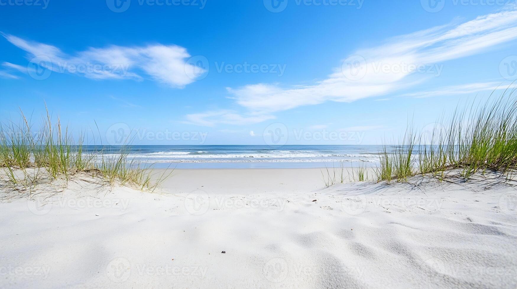 Serene Sandy Beach With Blue Sky and Ocean Waves Perfect for Summer Getaways photo