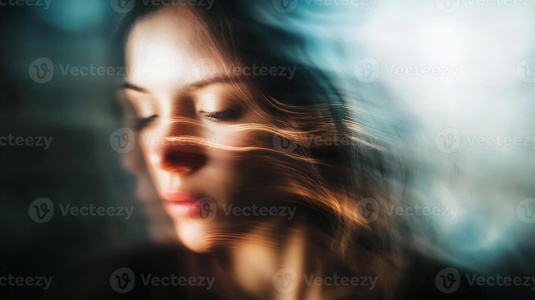 Blurred Portrait of Woman with Streaming Light Affecting Ethereal Atmosphere photo