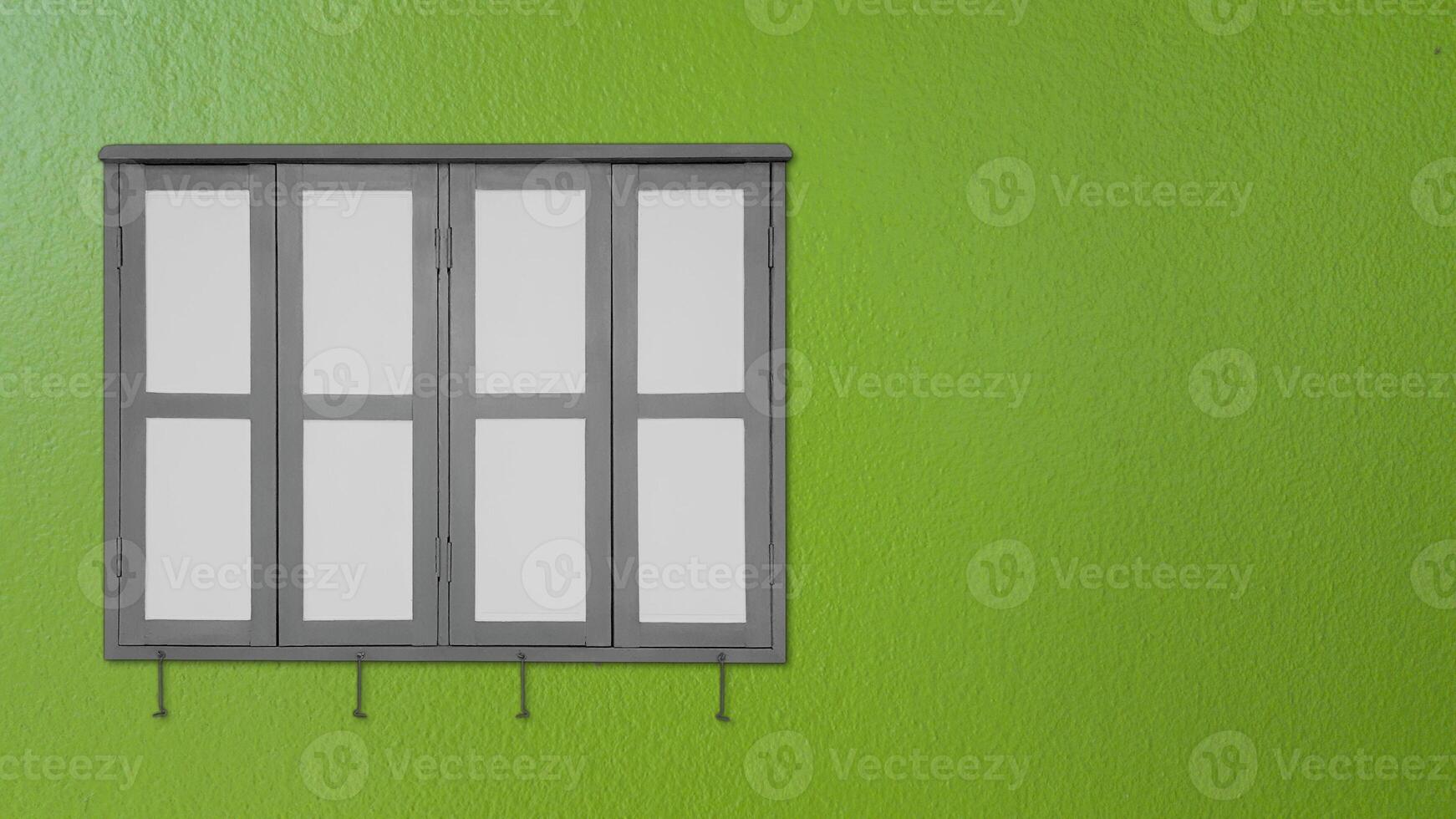 Window on green walls photo