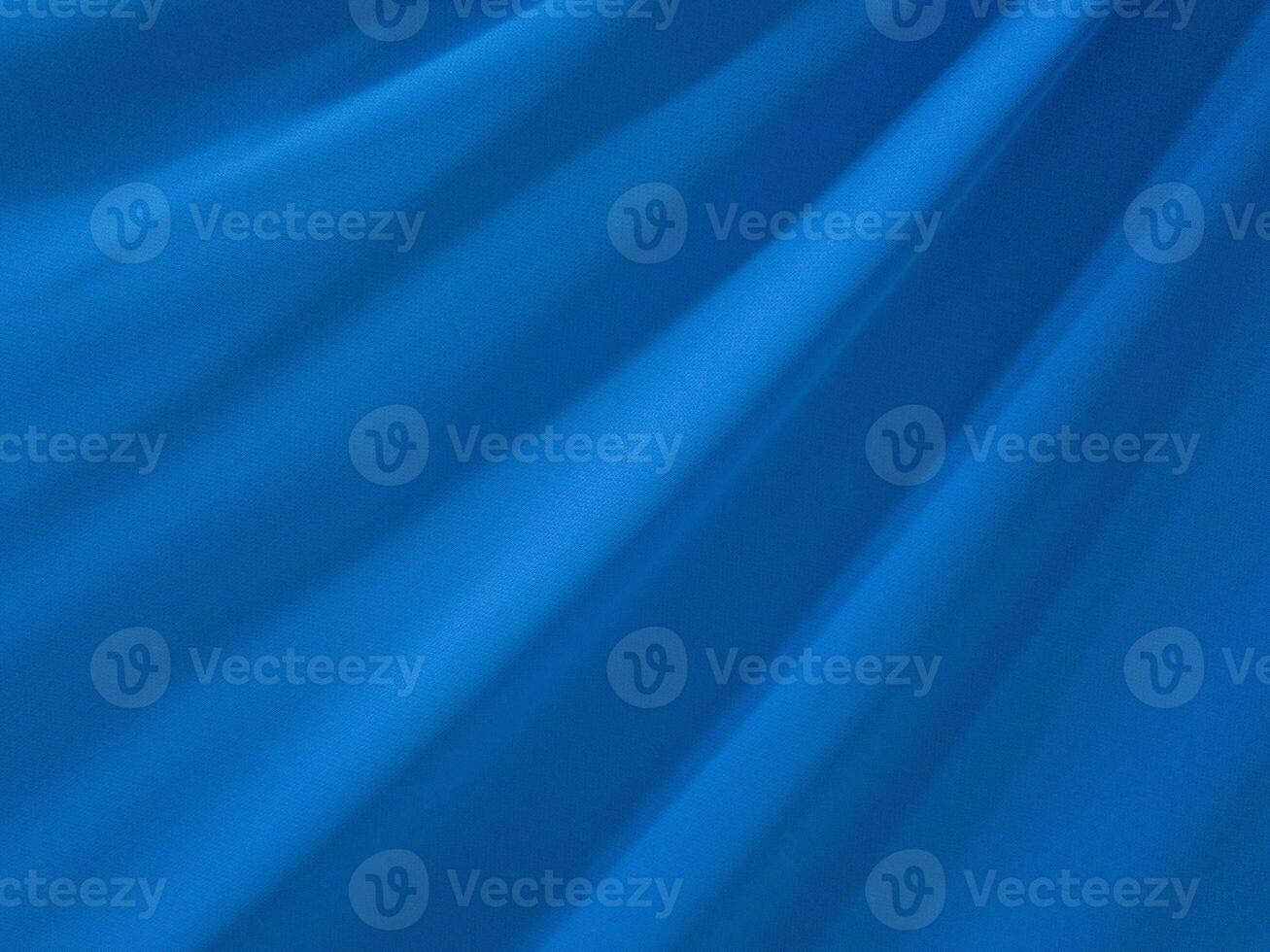 Texture background template. Silk color light blue background is a shiny light blue wave photo