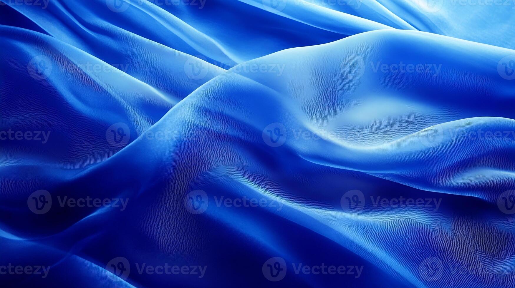 Elegant Blue Satin Fabric Folds with Smooth Texture and Play of Light photo