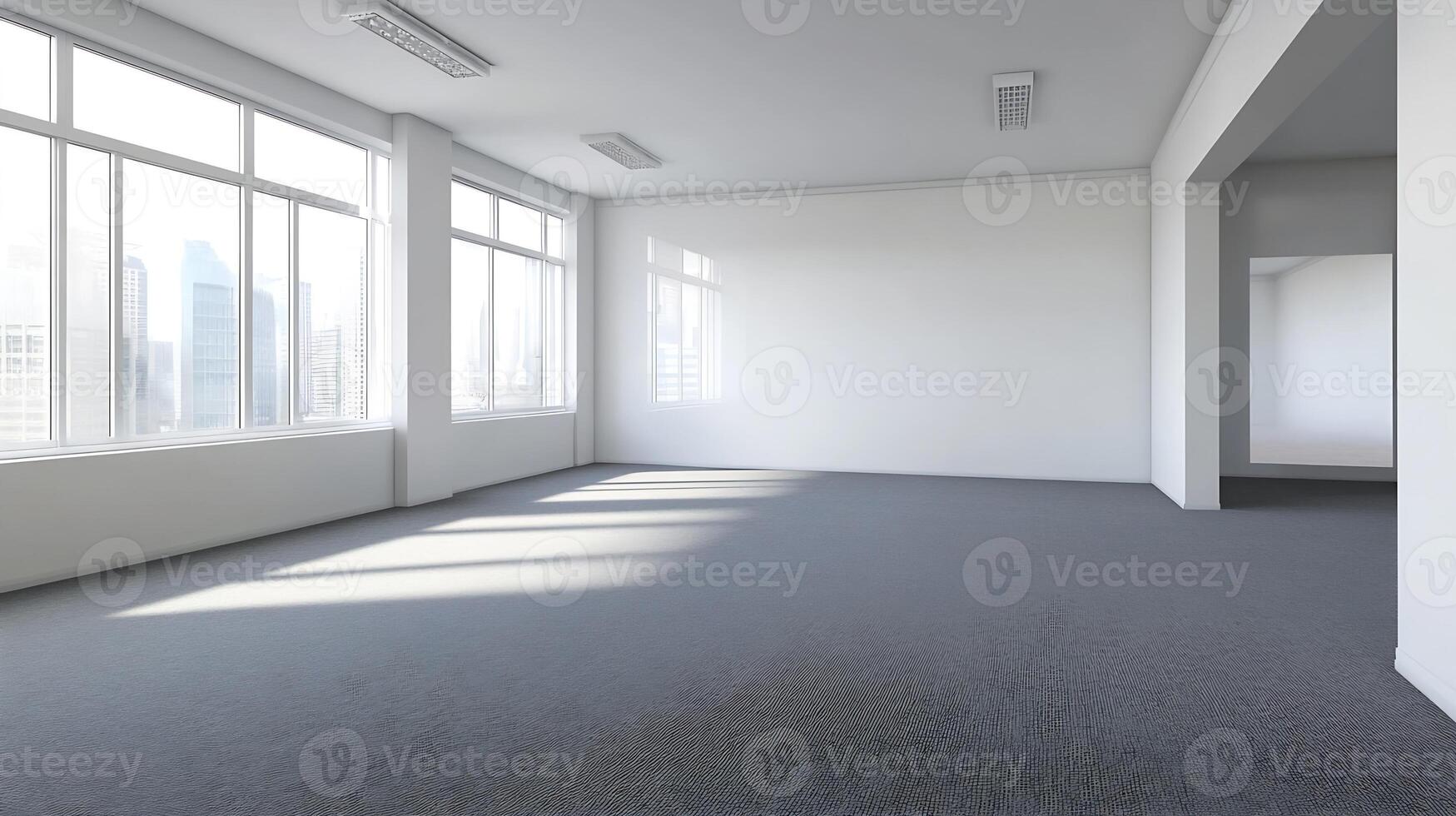Spacious Empty Office Space with Large Windows and Abundant Natural Lighting photo