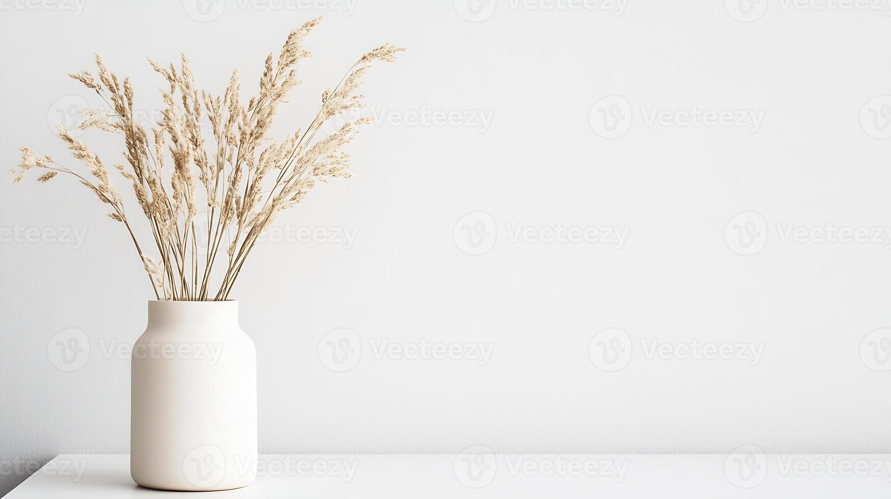 Elegant Minimalist Interior with Vase and Dried Botanical Decor on White Surface photo