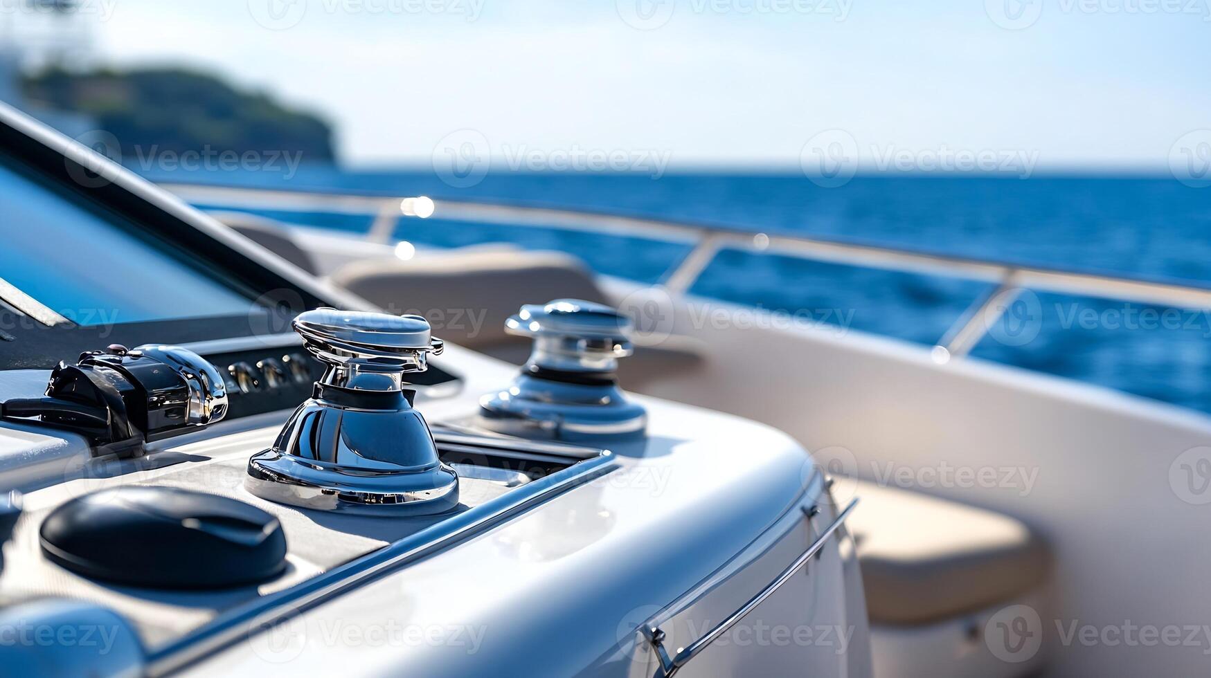 Modern Yacht Deck with Chrome Details and Ocean Backdrop Under Clear Blue Skies photo