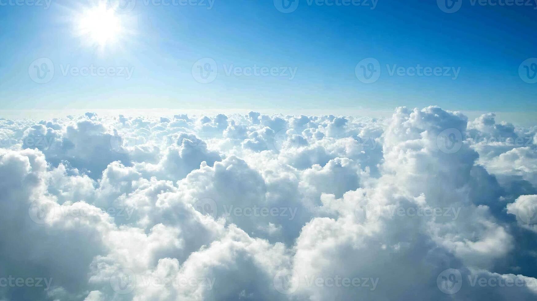 Vivid Blue Sky and White Puffy Clouds Creating a Stunning Bright Sunkissed Atmosphere photo
