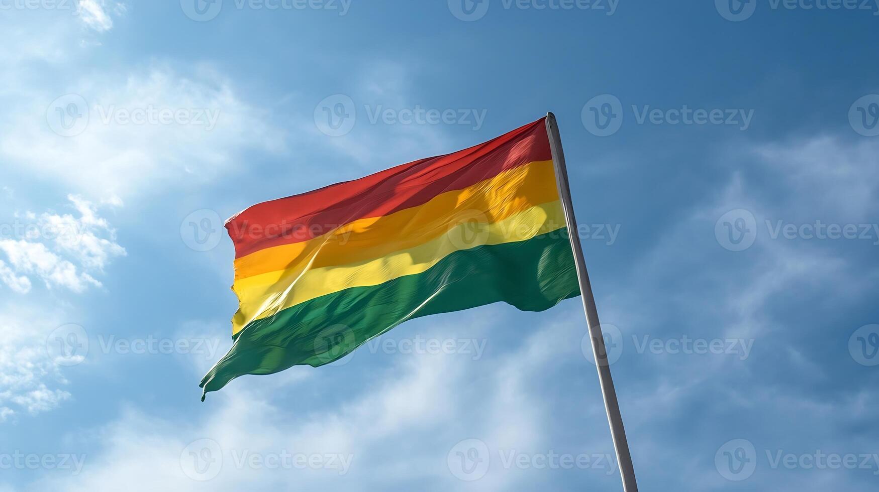 Vibrant Bolivian Flag Waving Against Clear Blue Sky Symbolizing National Pride photo