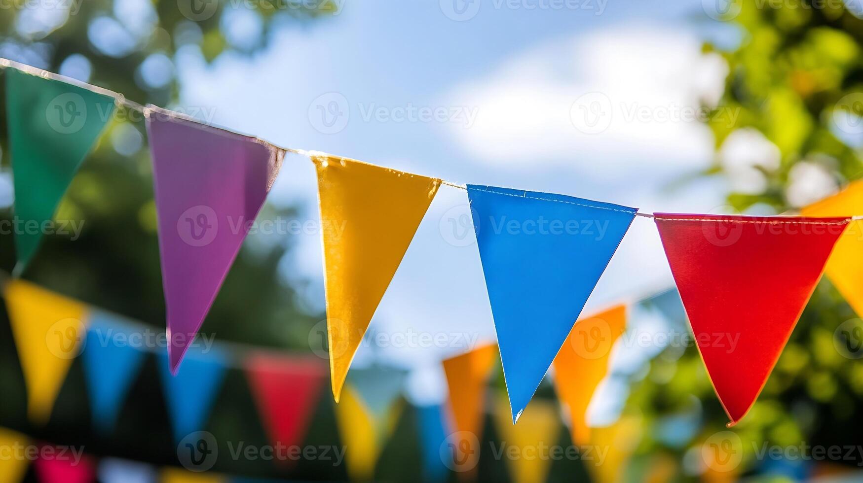 Colorful Triangle Bunting Flags Hanging Outdoors for a Festive Summer Celebration photo