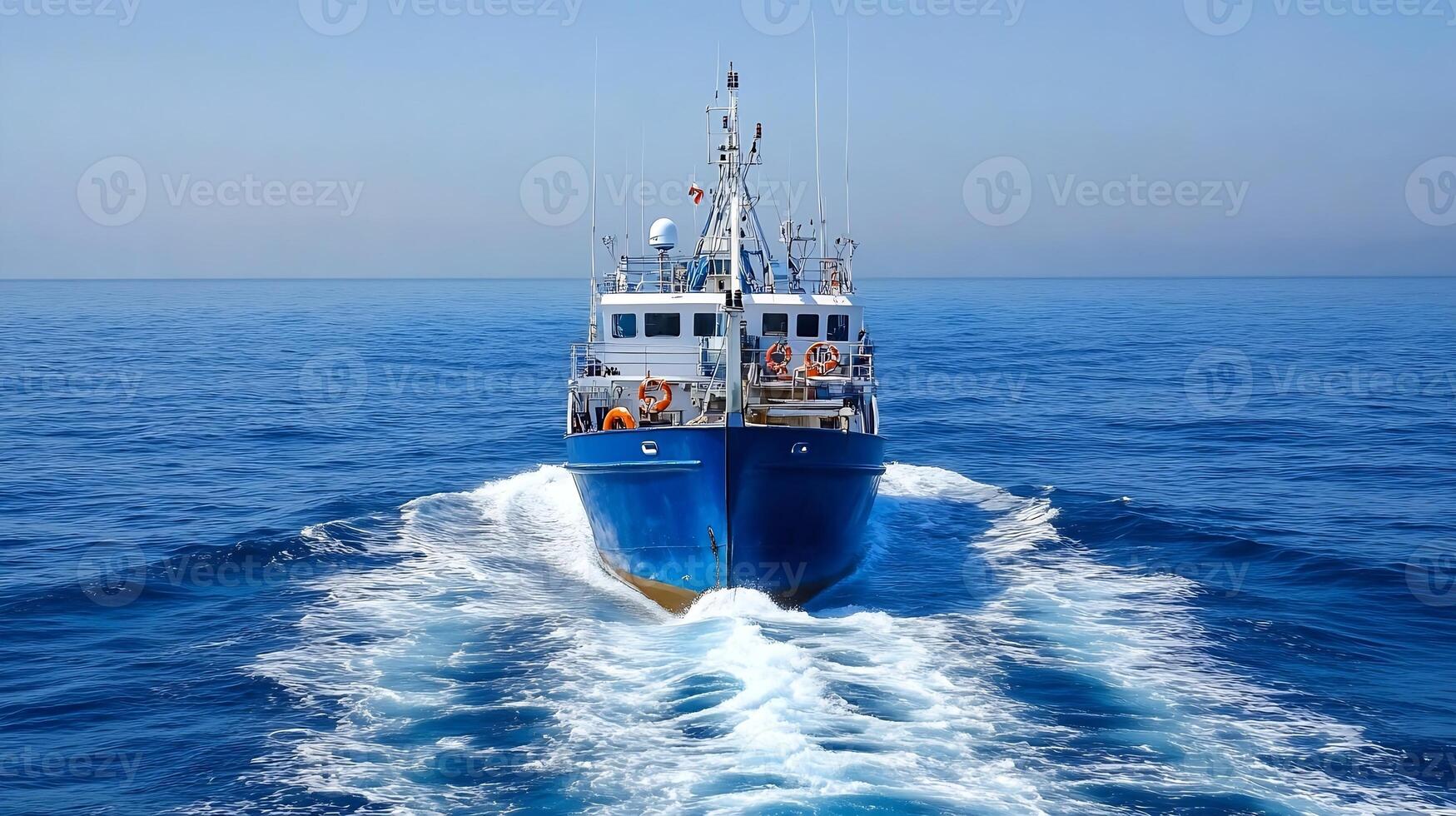 Small Fishing Boat Gliding Over Calm Ocean with Rippling Waves in Horizon photo