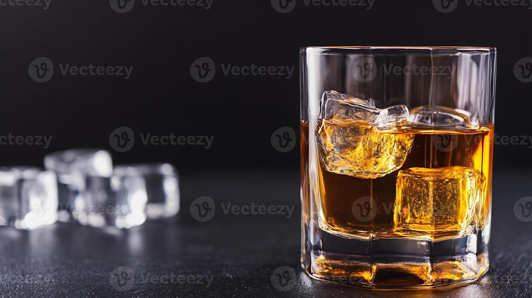Elegant Whiskey Glass with Ice Cubes on Dark Background for Upscale Beverage Photography photo