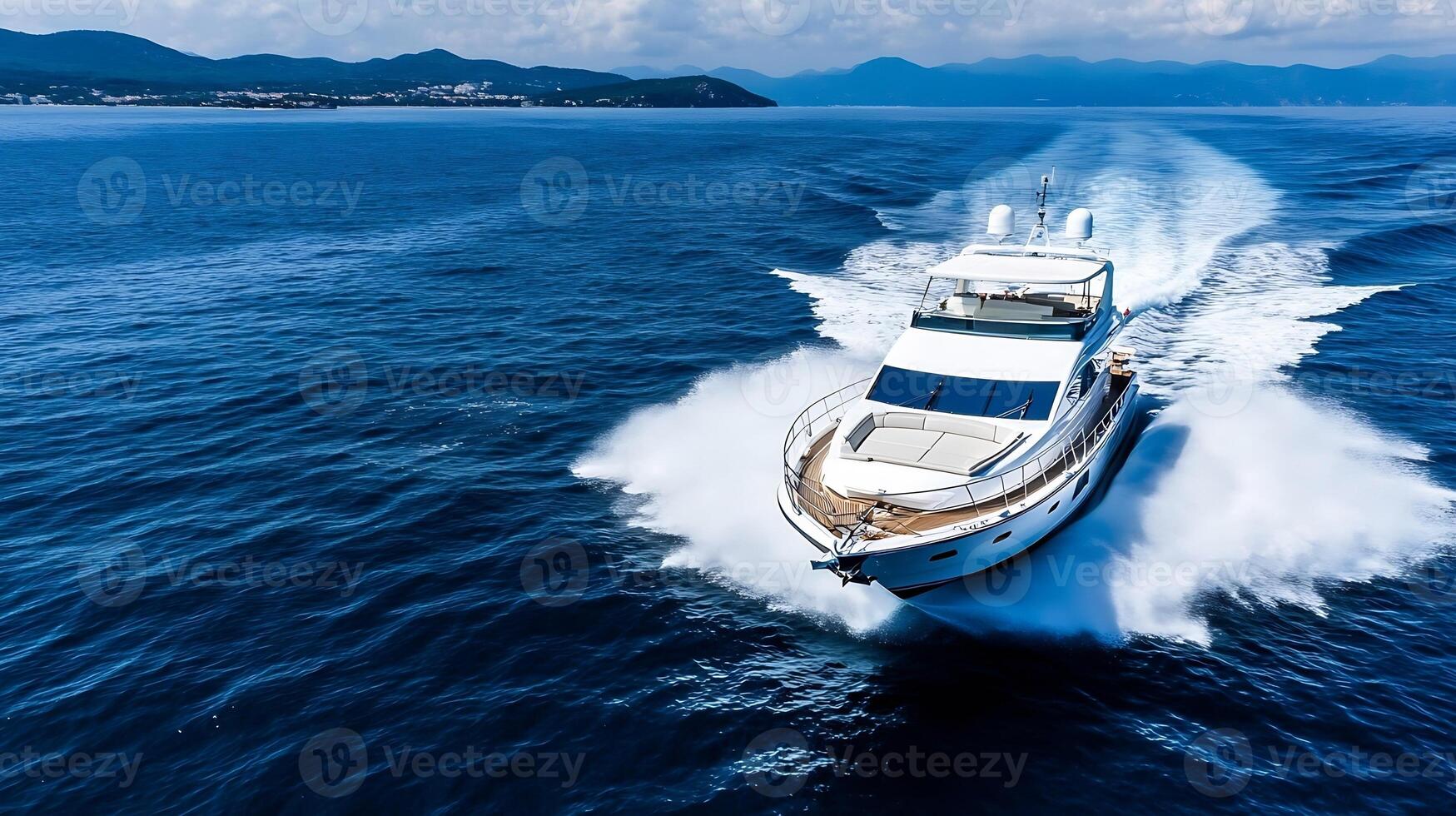 High-speed motor yacht cruising on open sea creating dynamic waves photo