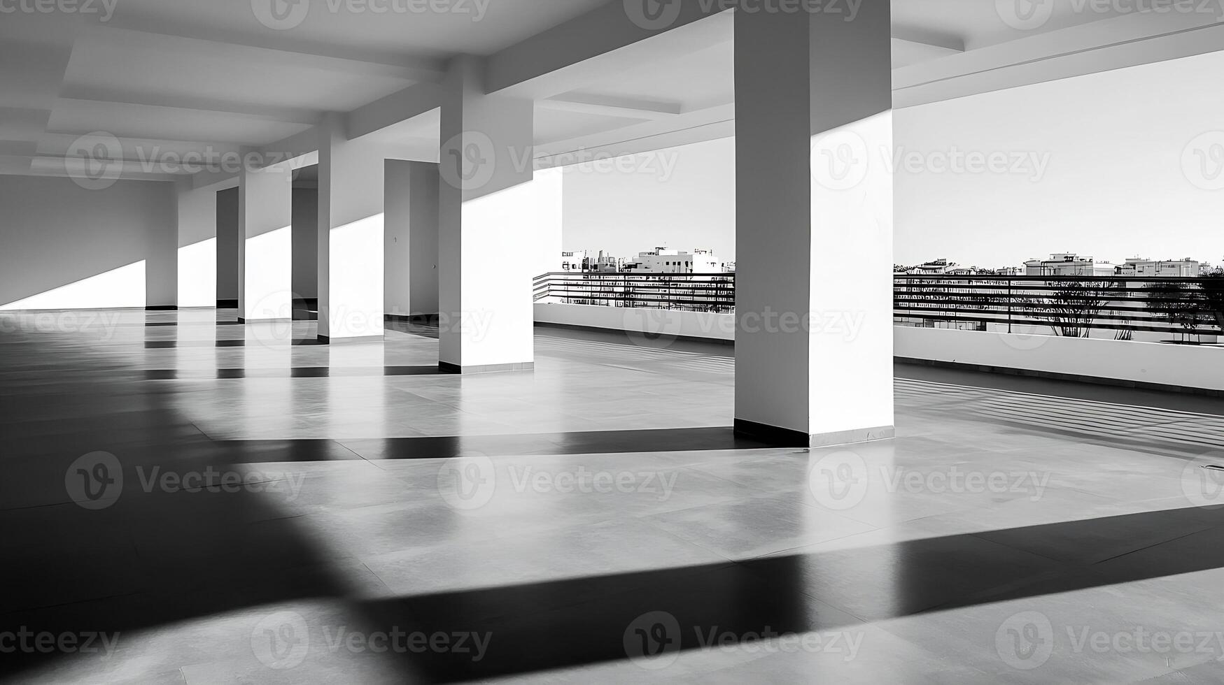Monochrome architectural structure with pillars and shadows emphasizing linear symmetry photo