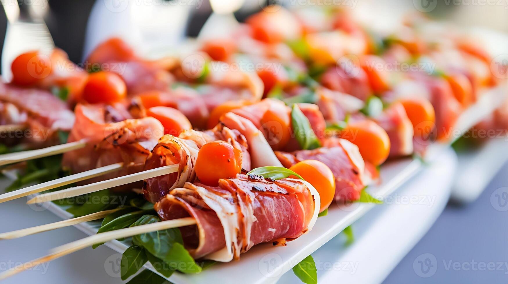 Appetizing Prosciutto and Cherry Tomato Skewers with Basil on White Platter photo
