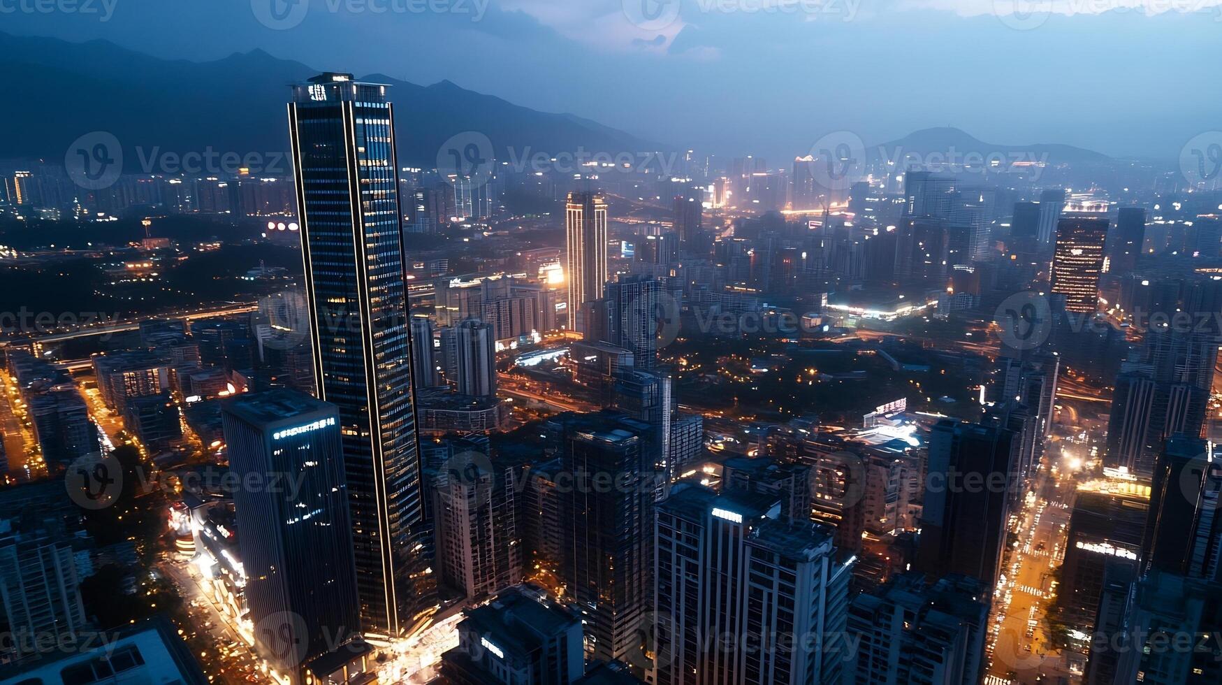 Vibrant Metropolis Skyline Illuminated at Twilight with Mountains photo