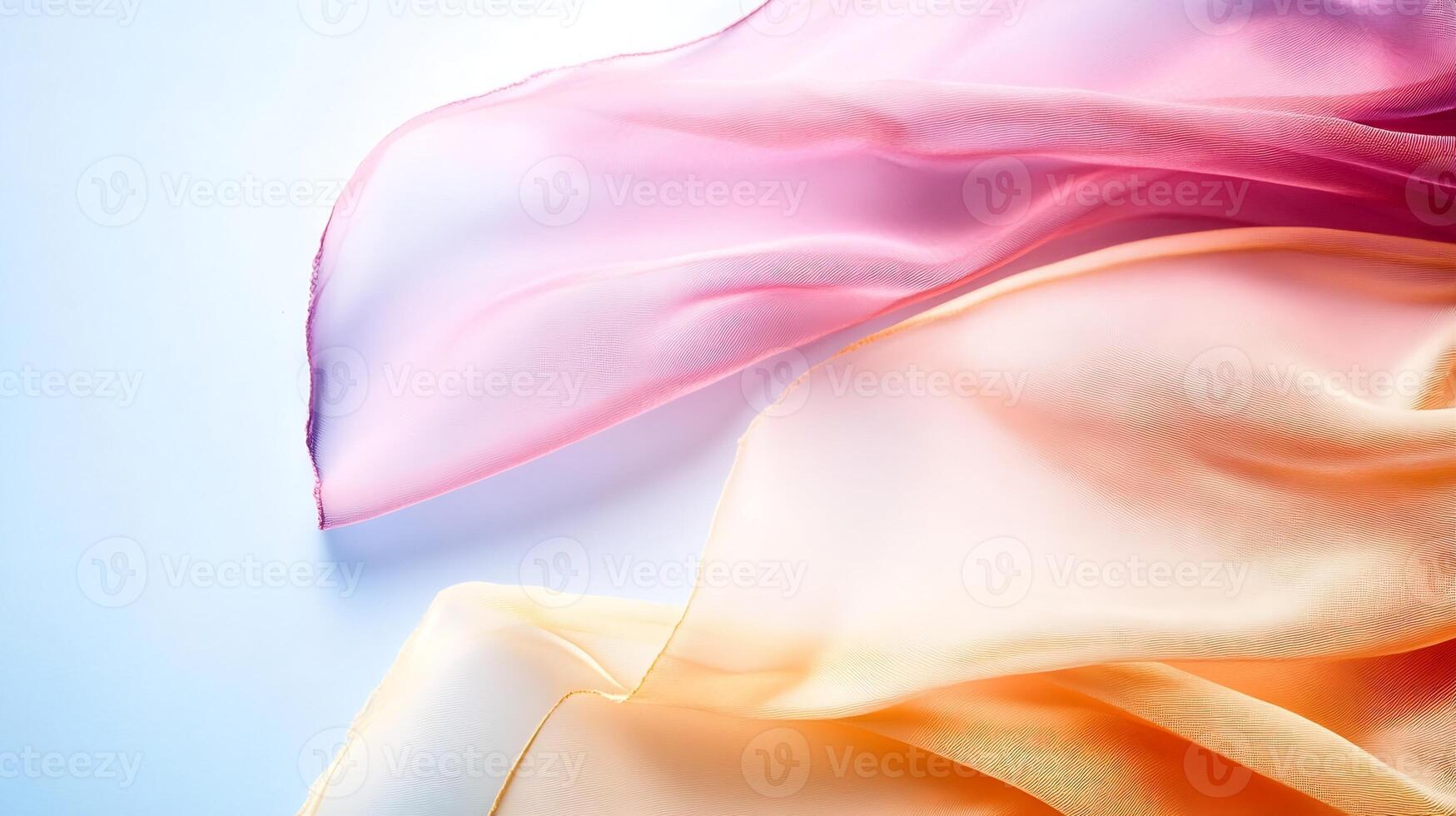 Soft Gradient of Sheer Pink and Orange Fabrics Overlaying on a Calm Light Background photo