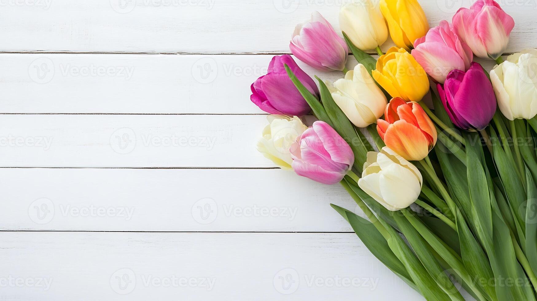 Vibrant Bunch of Multicolored Tulips on Rustic White Wooden Table photo