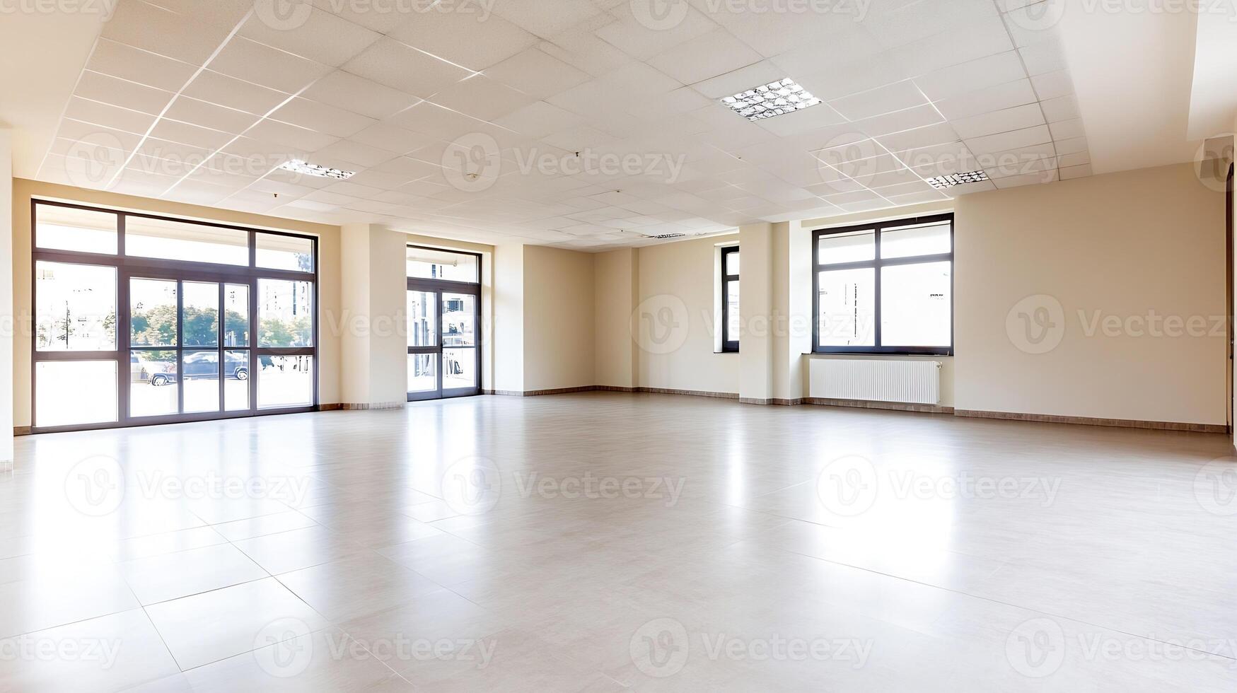 Spacious Empty Room Interior with Large Windows and Natural Light photo