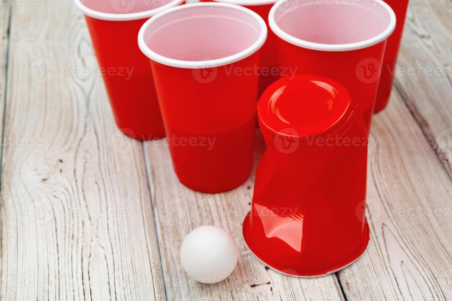 Cups for game Beer Pong on the table. creative photo. photo