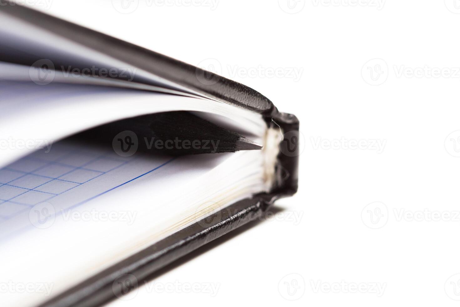 Pen and notebook close up photo