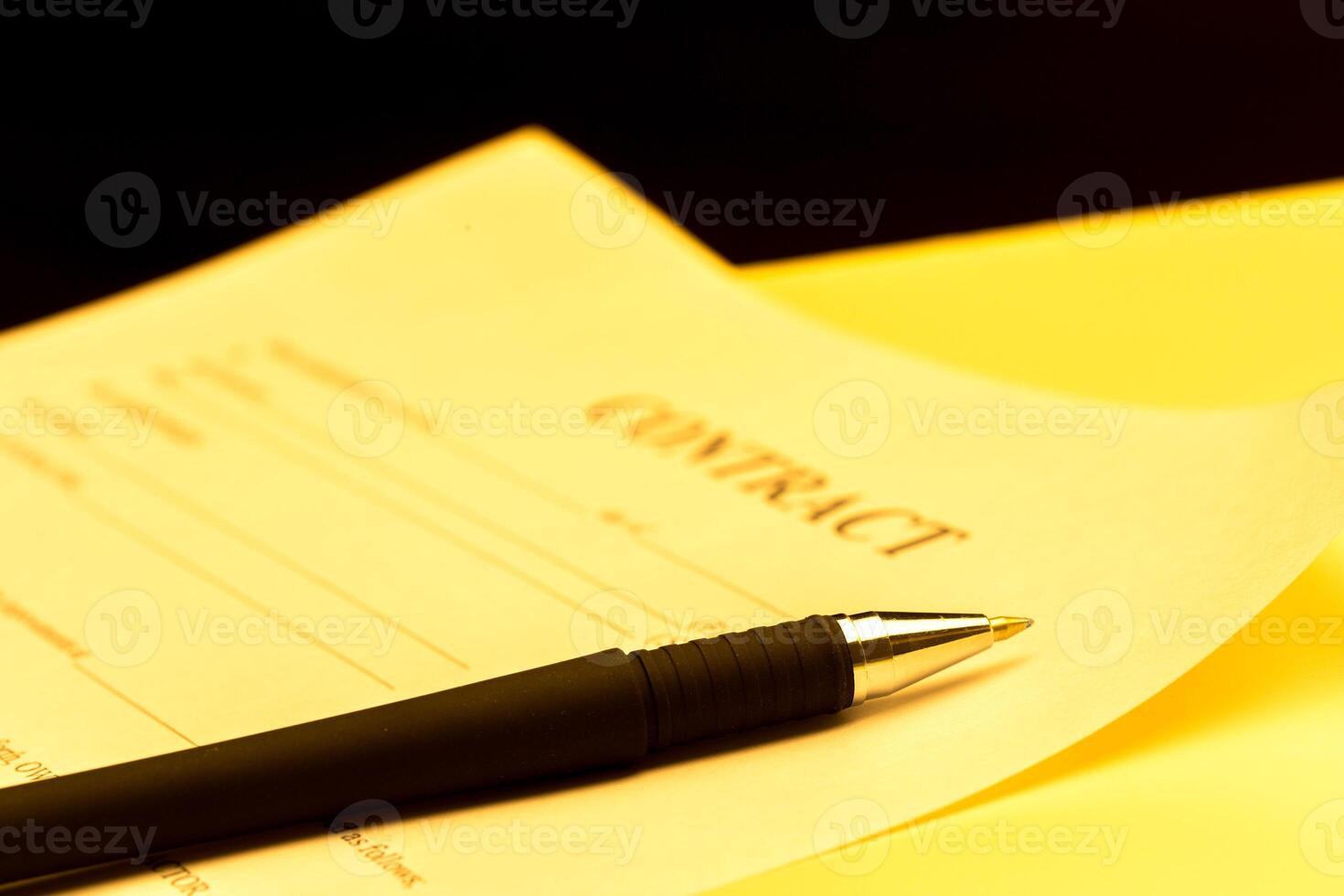 Close-up of pen on contract. photo