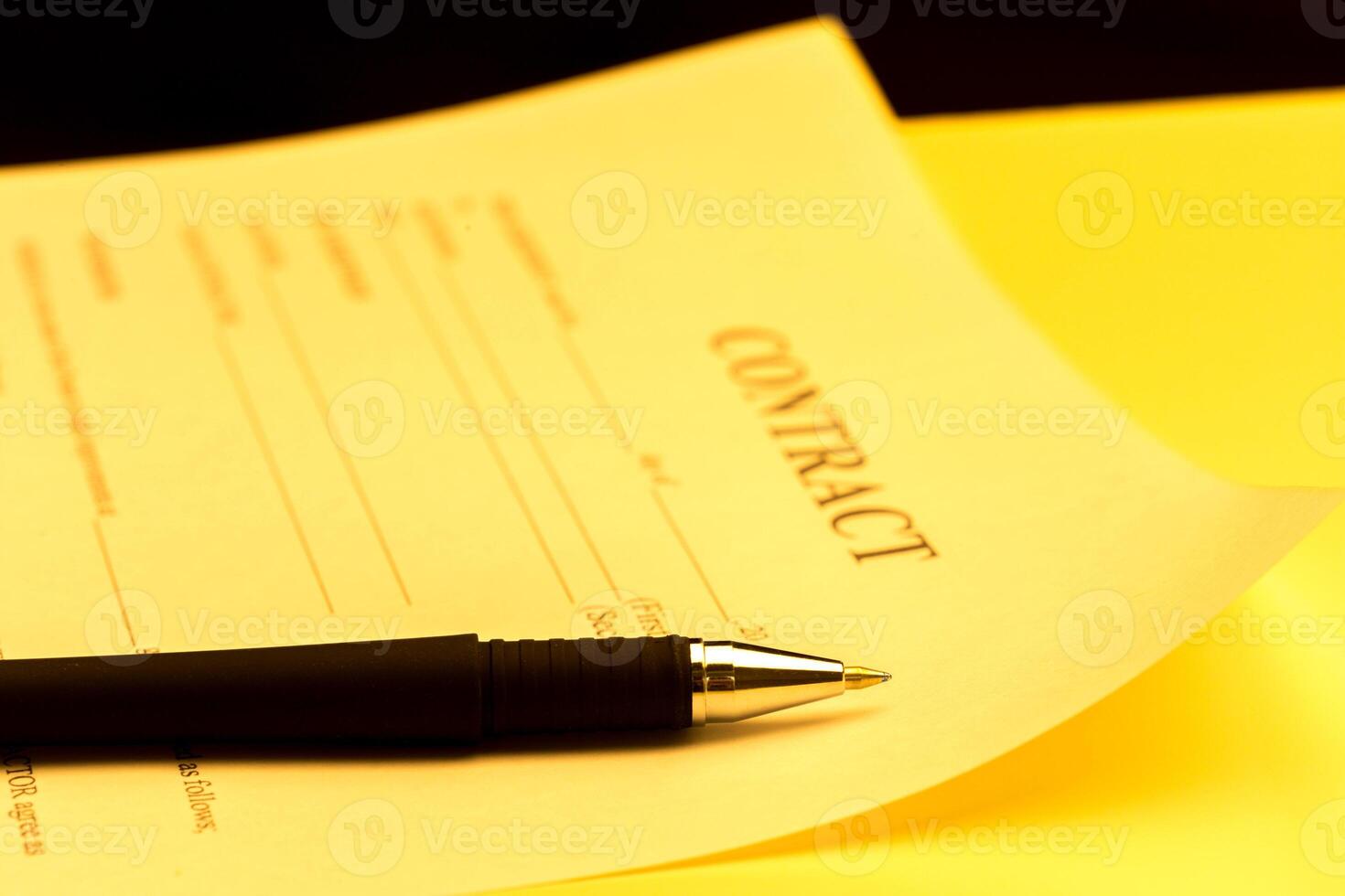 Close-up of pen on contract. photo