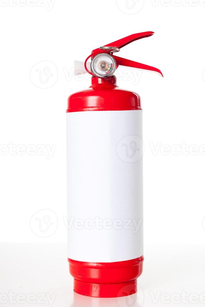 Red fire extinguisher isolated on white photo