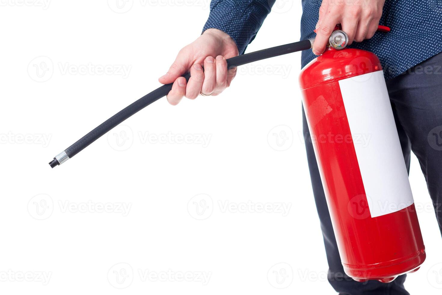 Man using fire extinguisher isolated on white photo