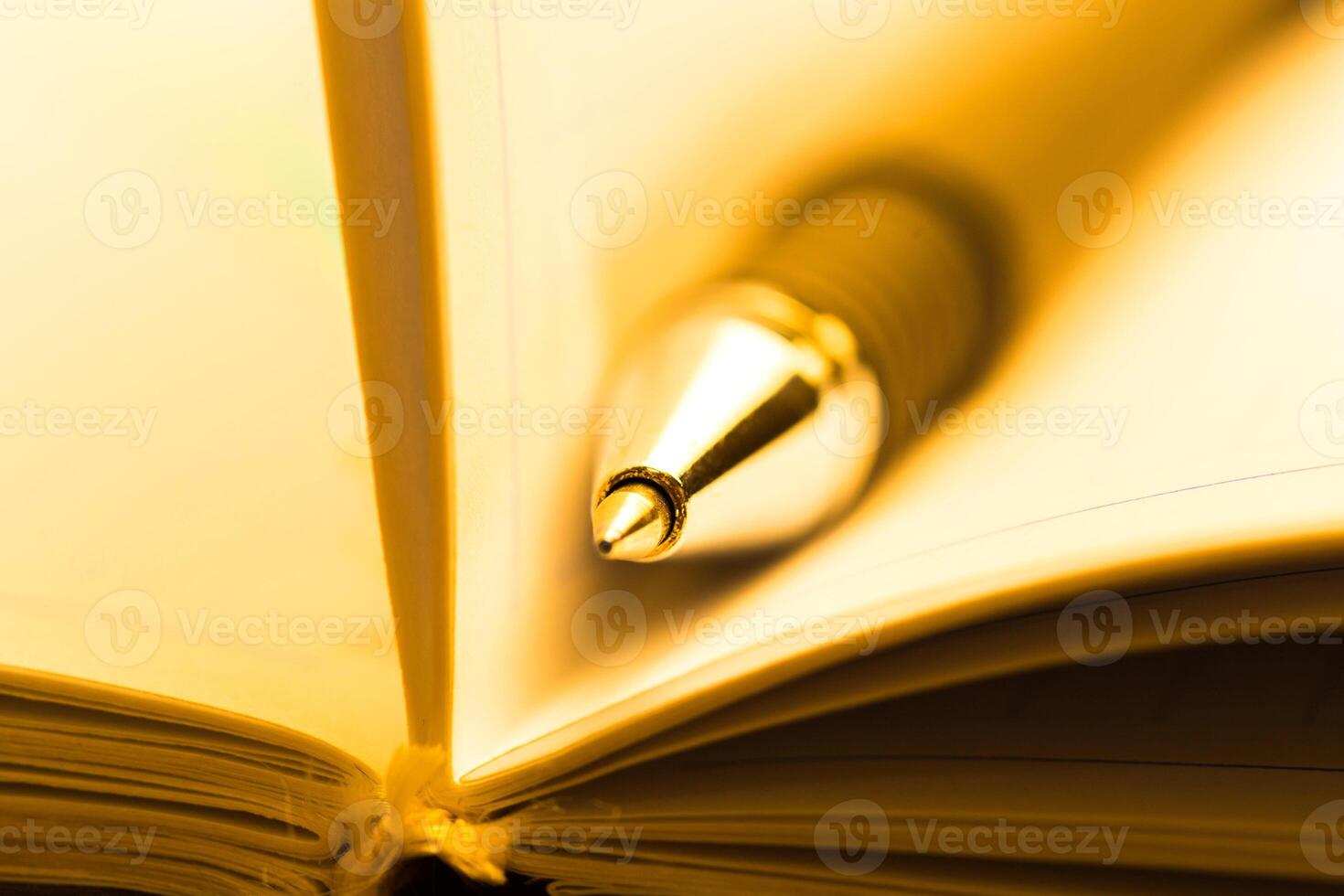 Pen and notebook close up photo