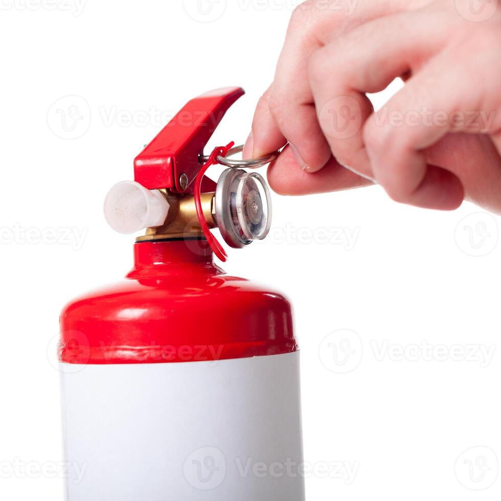 Man using fire extinguisher isolated on white photo