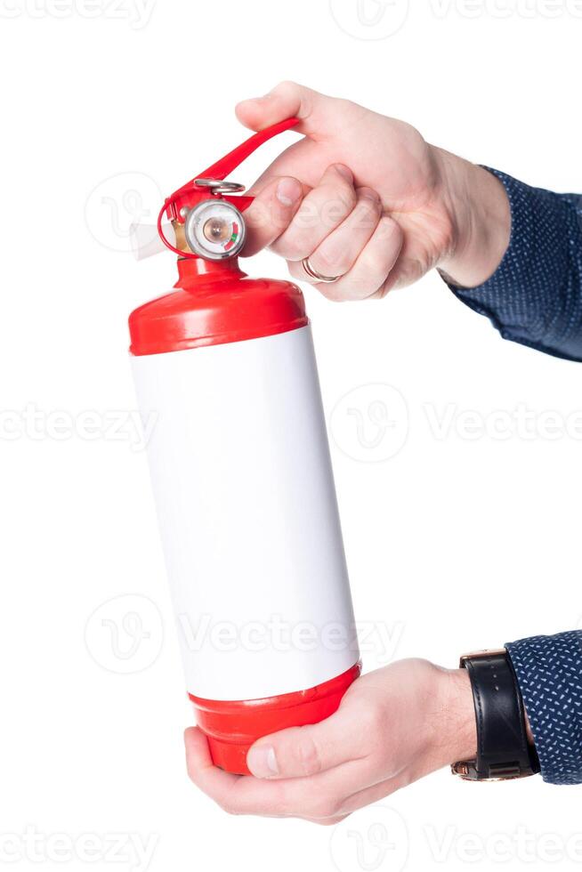 Man using fire extinguisher isolated on white photo