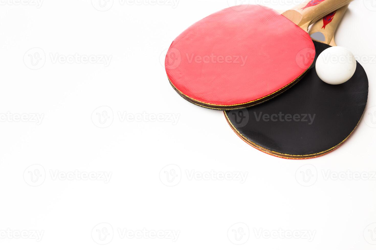 ping-pong rackets and ball, isolated on white photo