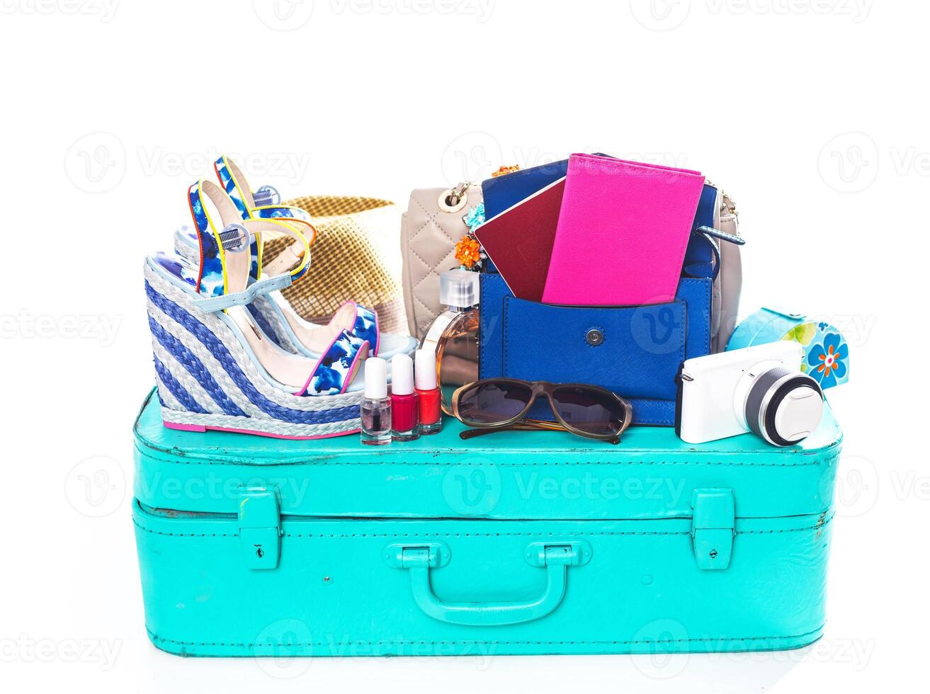 Packing suitcase for trip isolated on white photo